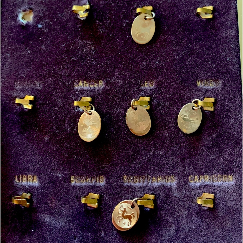10k - zodiac signs charms sold separately.        $20 dollars each